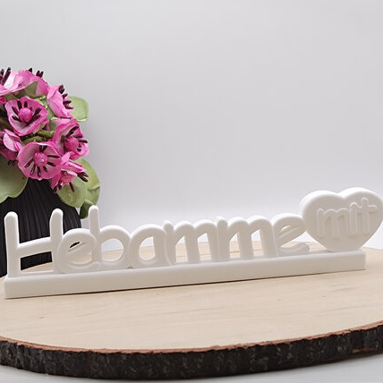Schriftzug Hebamme mit Herz aus Raysin als persönliche Geschenkidee für Hebammen und werdende Eltern