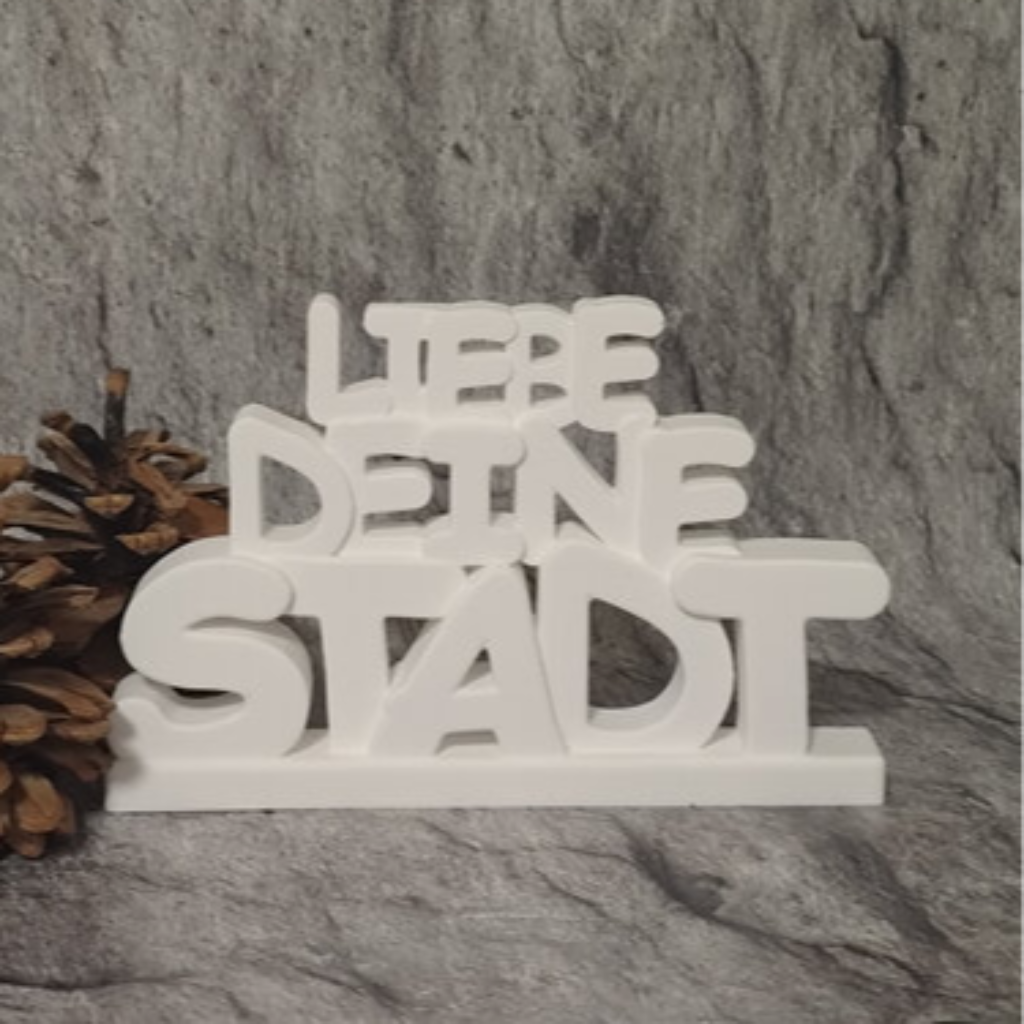 Detailansicht des Schriftzugs Liebe Deine Stadt aus Raysin für moderne Stadtdeko, Heimatverbundenheit und kreative DIY Dekorationsprojekte