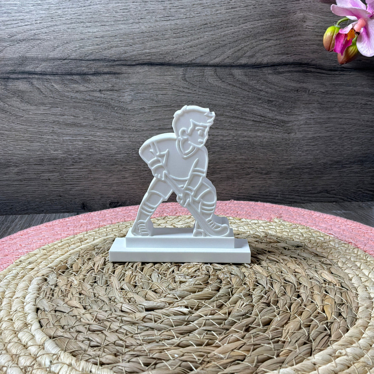 Hockeyspieler auf Podest mit passender Silikonform